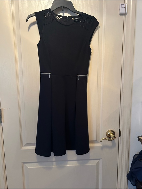Dresses & Skirts - Classic Black Sleeveless A-Line Dress with Embellished Neckline